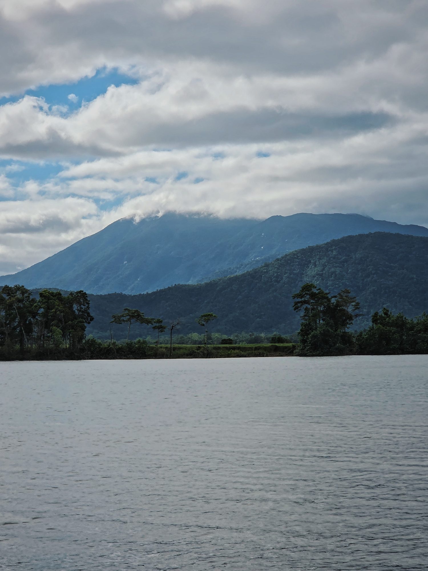 Mountain swallowed by cloud, after the rain.