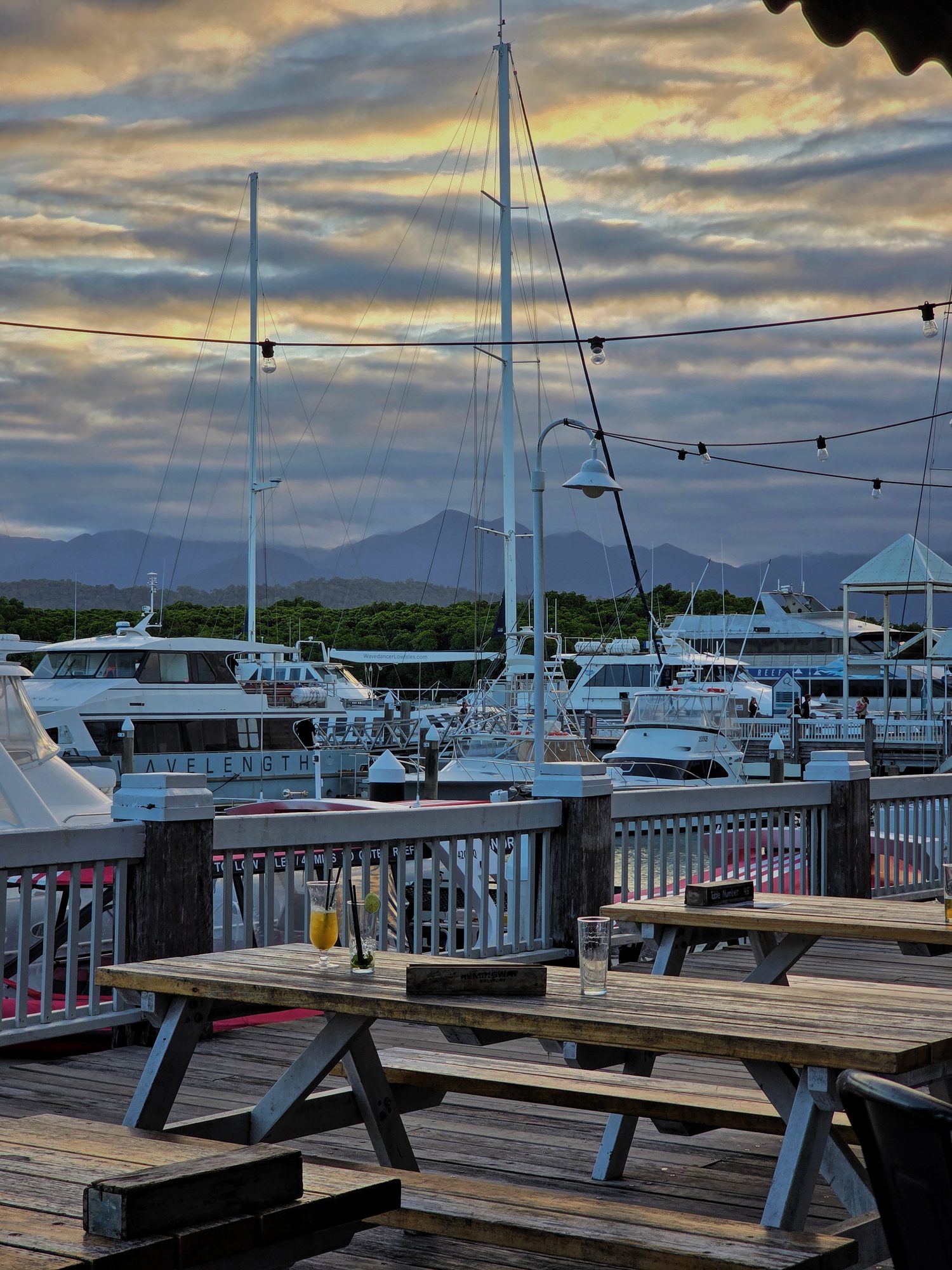 Last light at the marina, drinks on the bench.