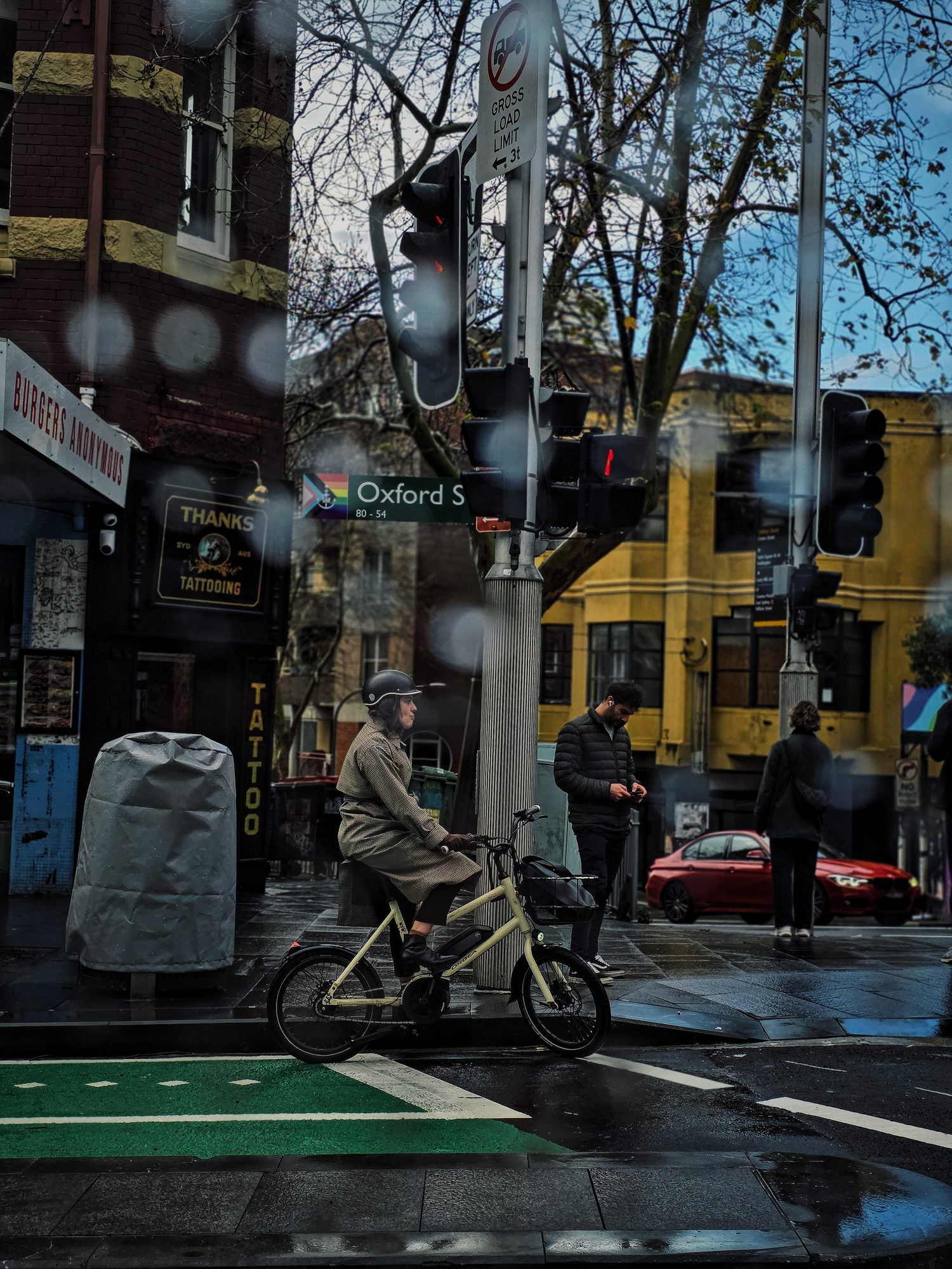 Oxford Street, rain on the lens, light just changed.
